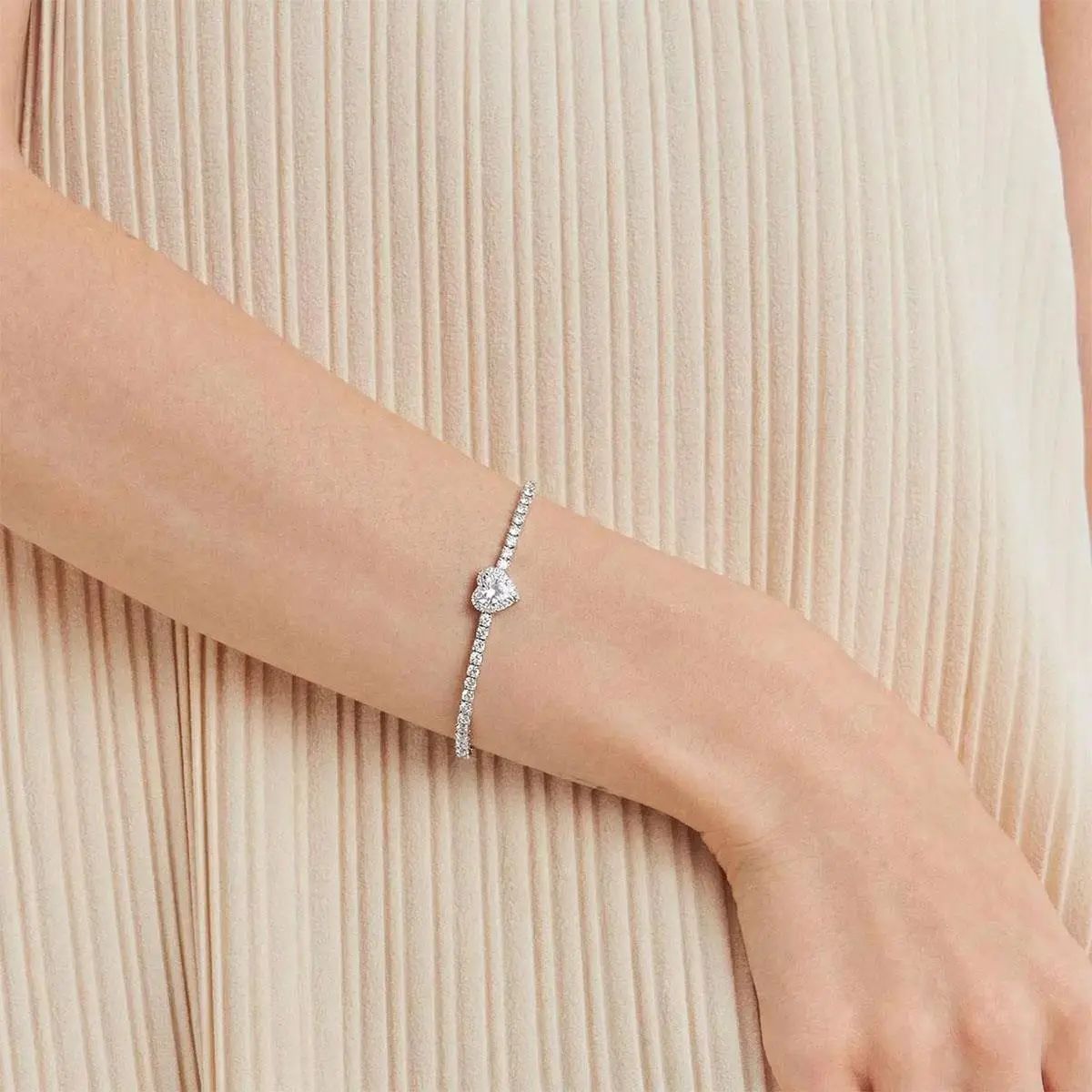 PULSEIRA RIVIERA COM CORAÇÃO EM CRISTAL PRATA RODINADA